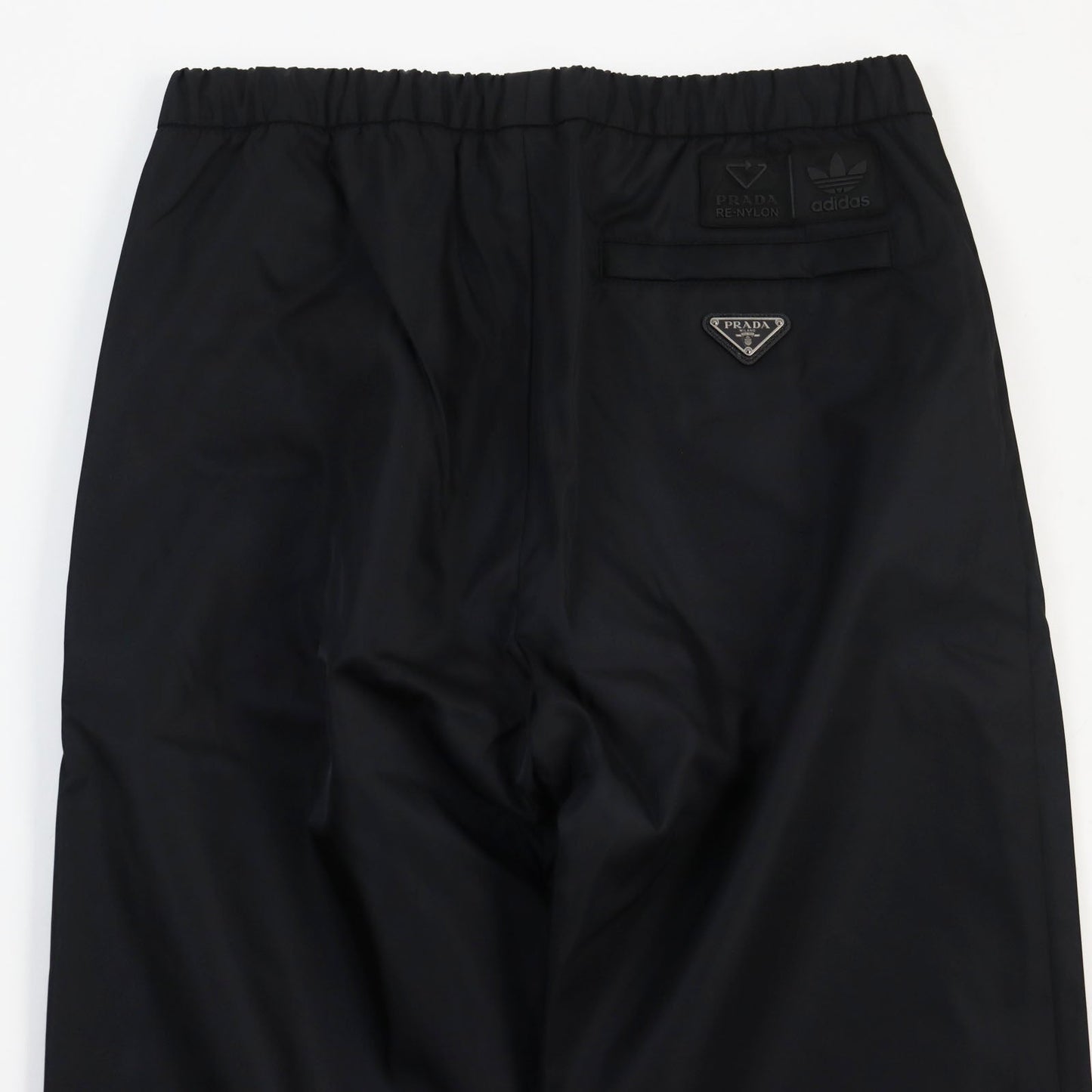 PRADA Pants SPH55 Outer: 100% recycled polyamide, Lining: 100% polyester, Partially: cowhide black Re Bylon triangle logo track pants mens M