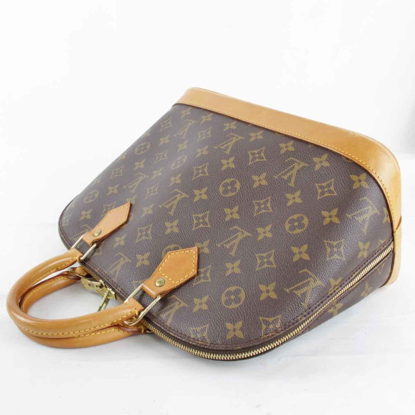 LOUIS VUITTON Alma Handbag