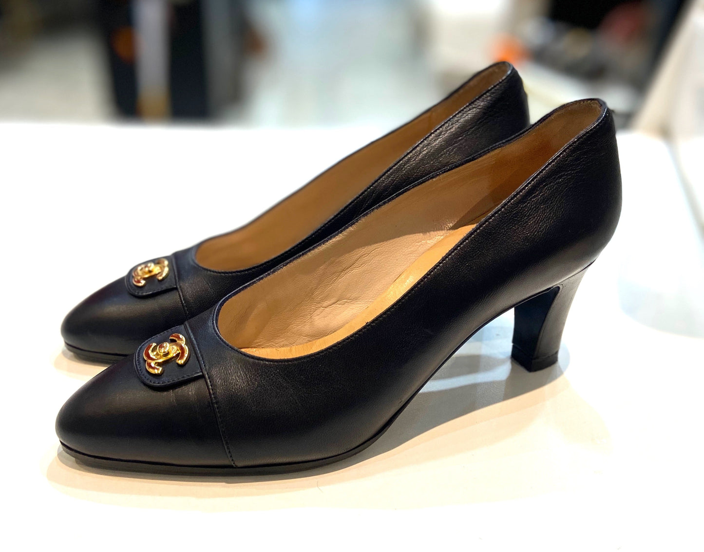 CHANEL CC TURN-LOCK POINTED TOE CALFSKIN LEATHER PUMPS Handbag
