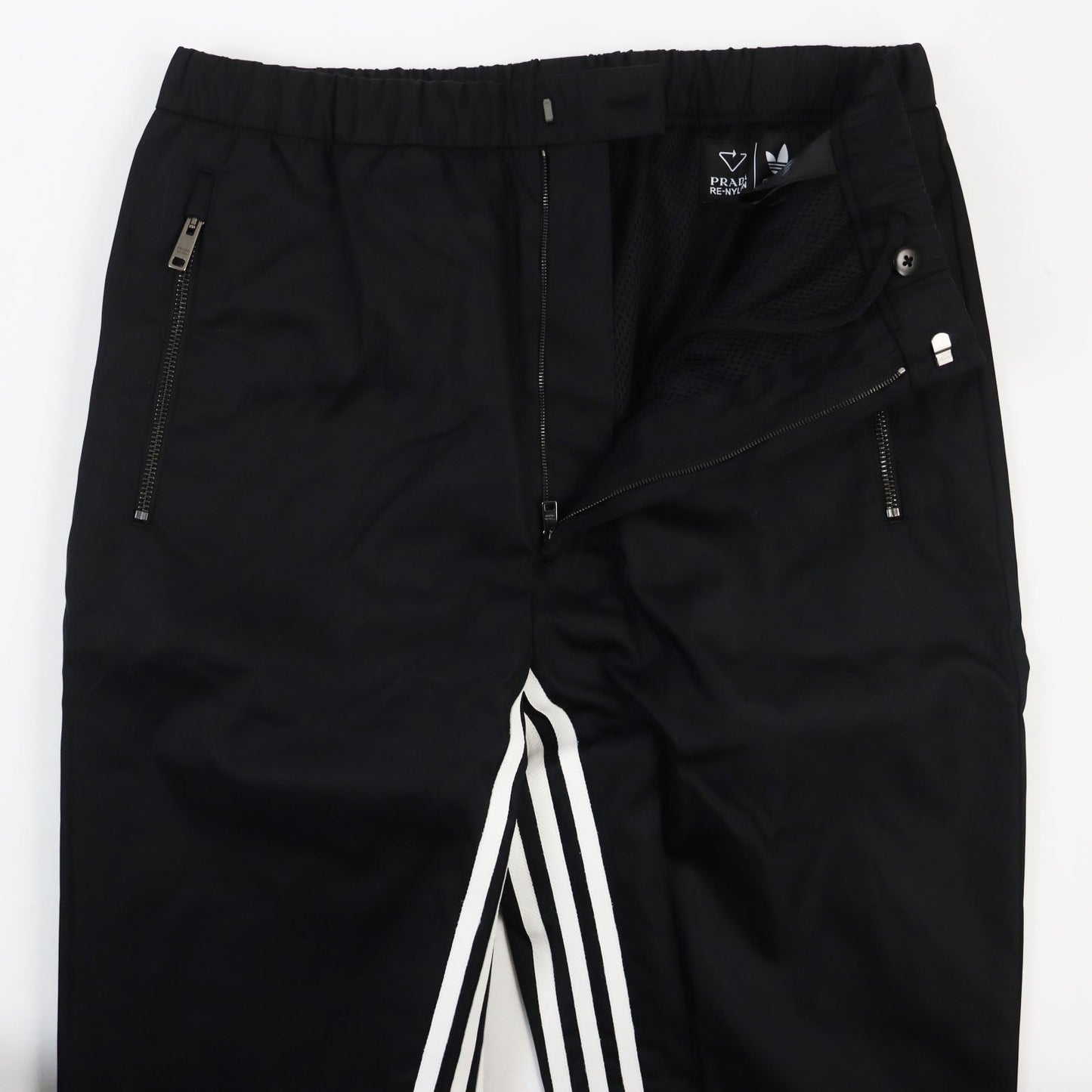 PRADA Pants SPH55 Outer: 100% recycled polyamide, Lining: 100% polyester, Partially: cowhide black Re Bylon triangle logo track pants mens M