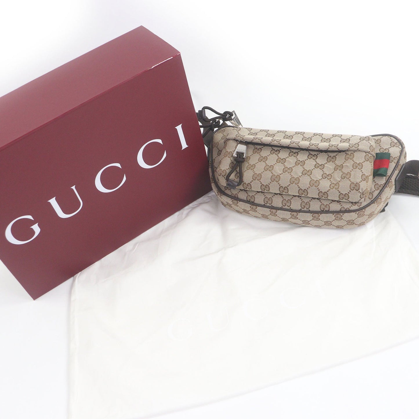 Gucci GG Canvas Sling Bag