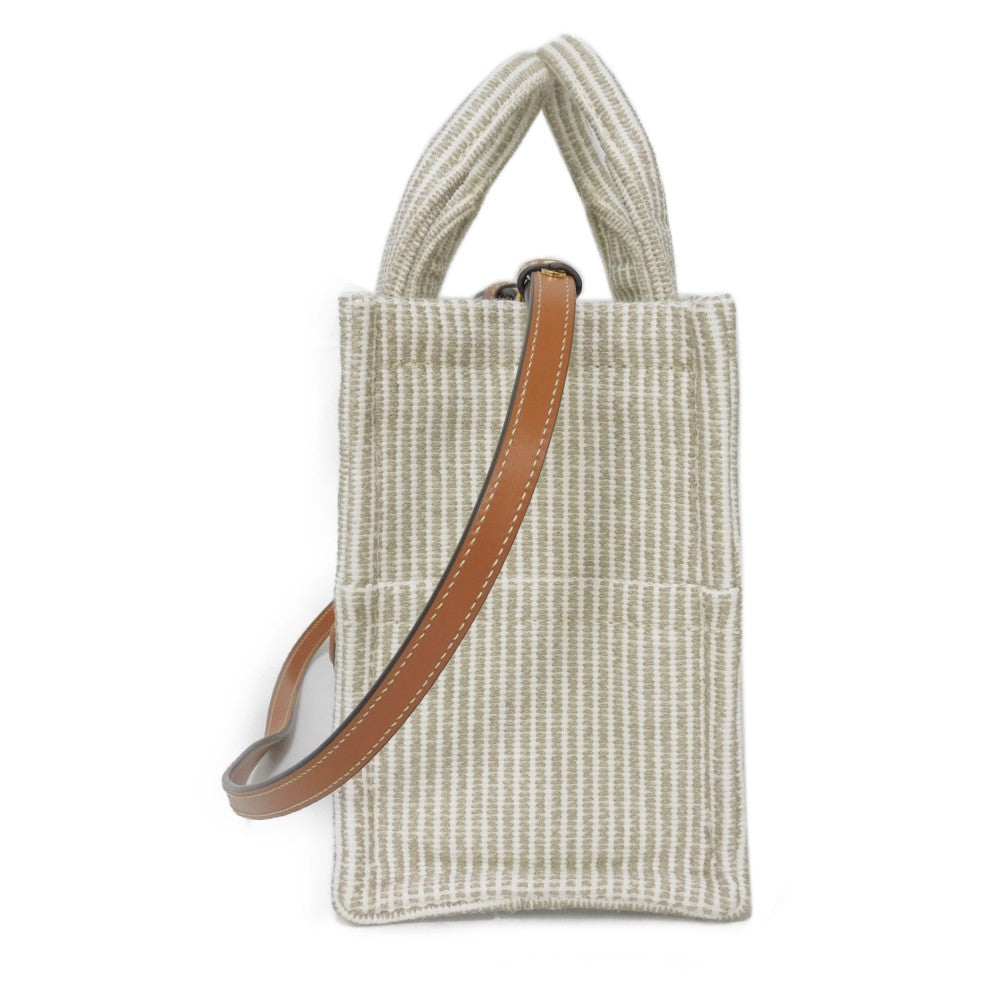 CELINE Handbag. Textile x Calfskin beige Triomphe Small Hippo Tice Women