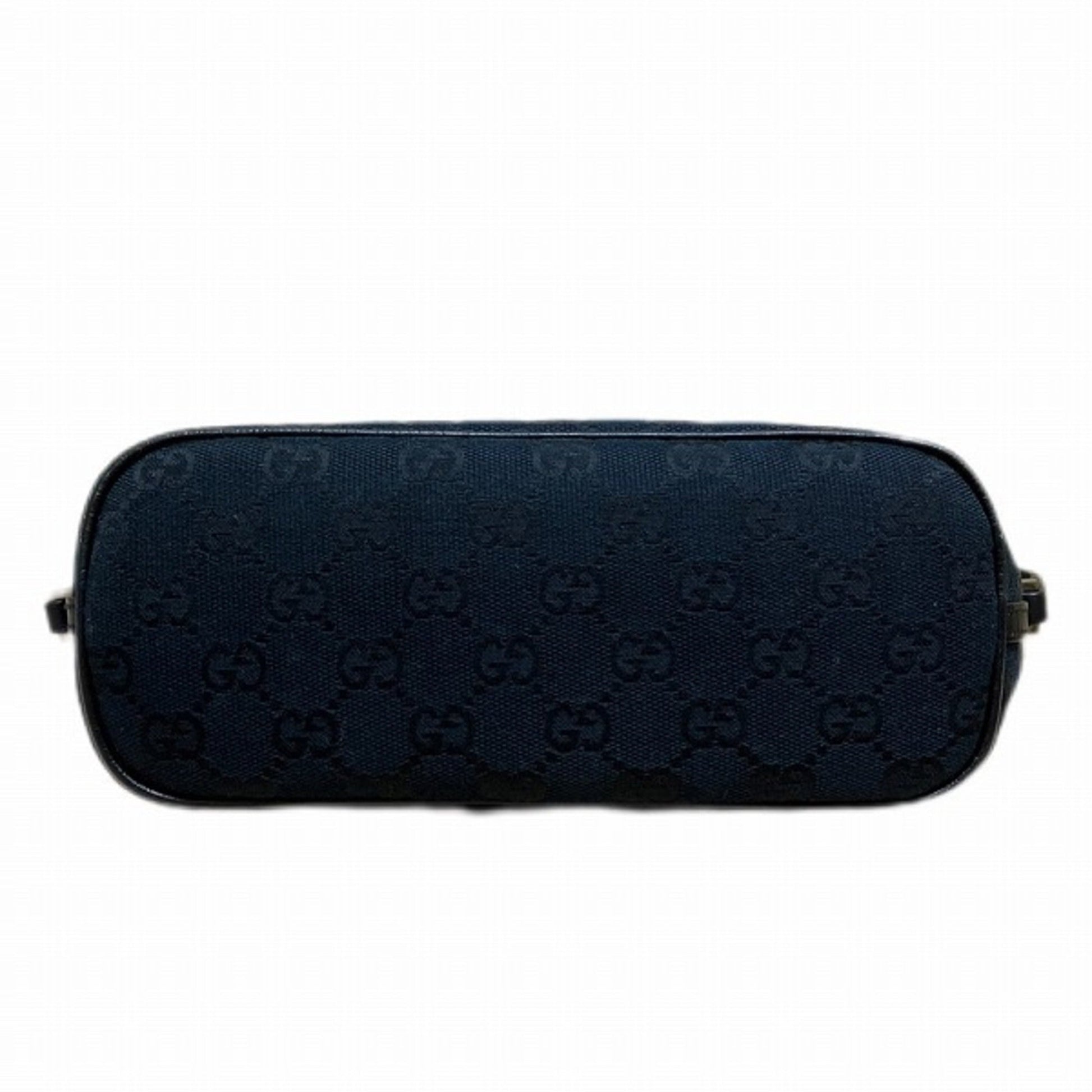 Gucci Canvas Clutch