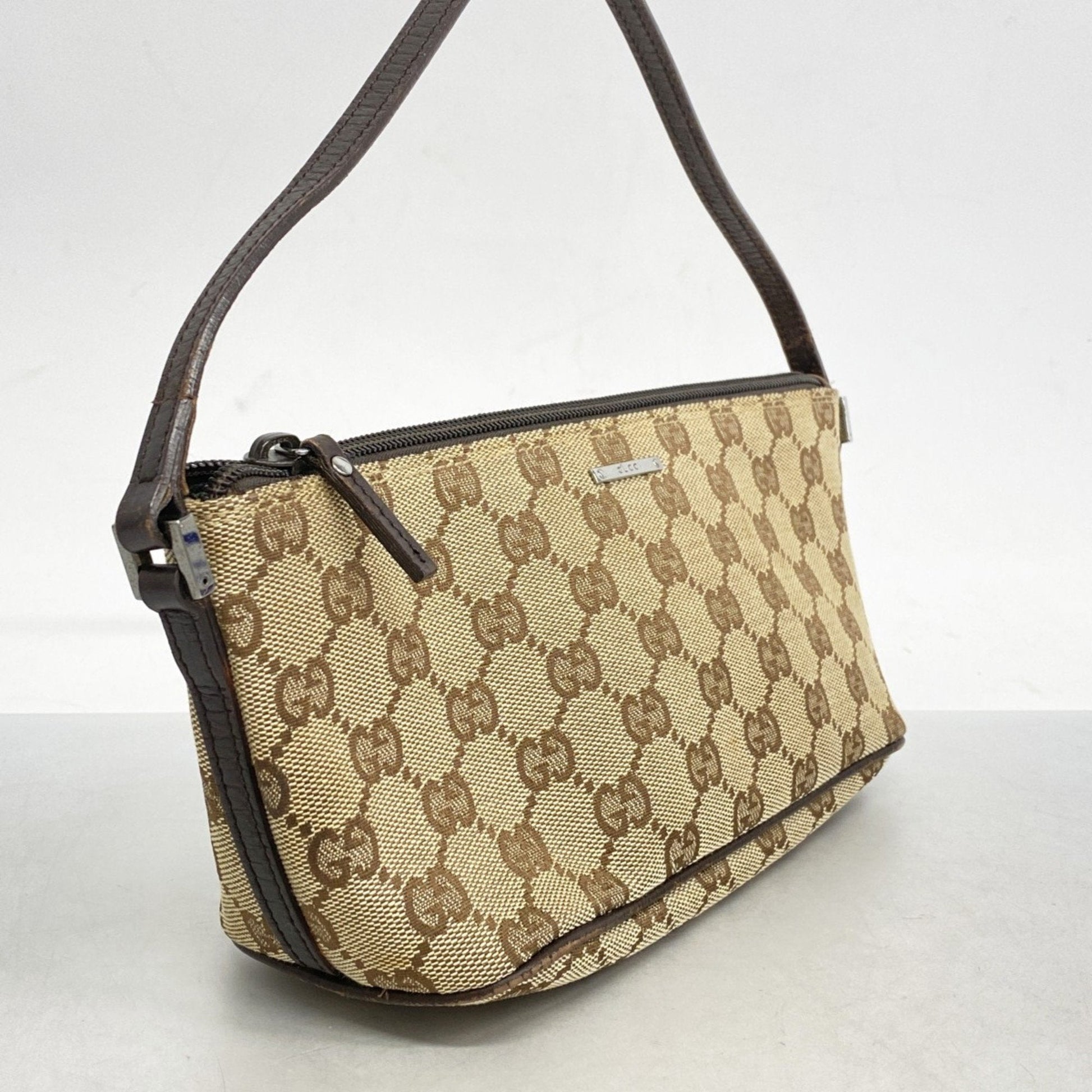 Gucci Leather Canvas Clutch