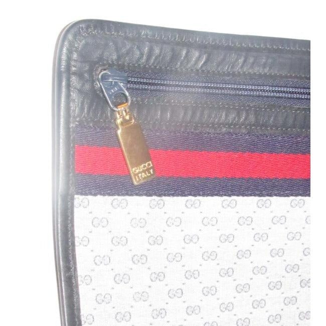 Gucci Leather Canvas Clutch