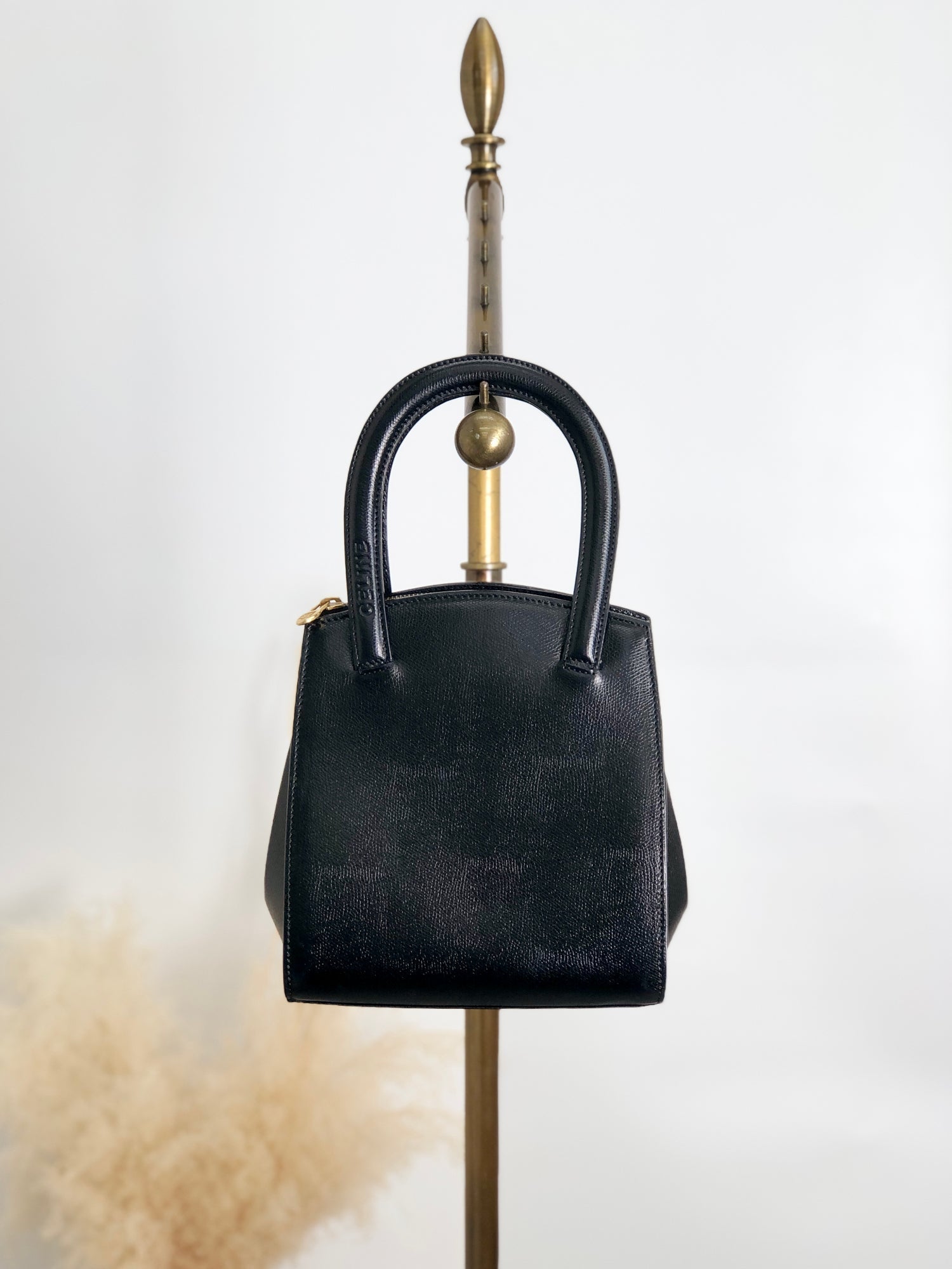 CELINE Logo Embossed Handbag Black b6gjb2