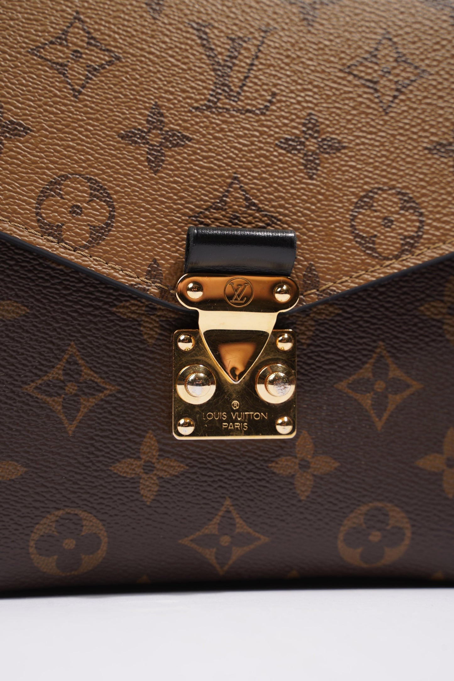 Louis Vuitton Womens Pochette Metis Reverse Monogram Clutch