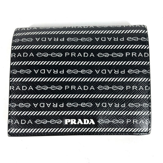 PRADA Folded wallet 1MV204 leather black All-over logo Women
