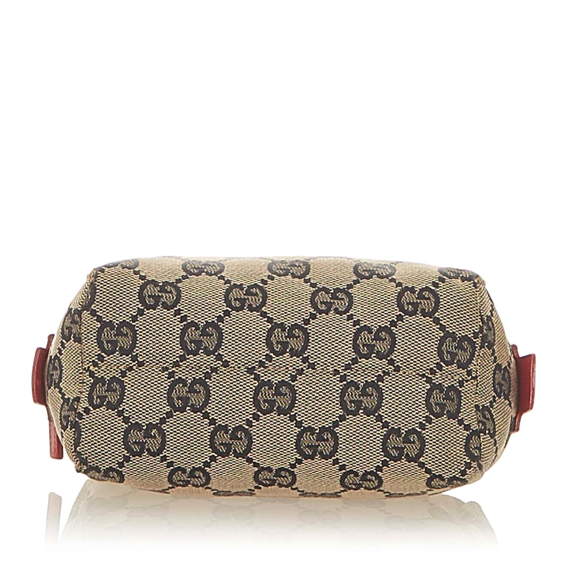 Gucci Leather Canvas Clutch