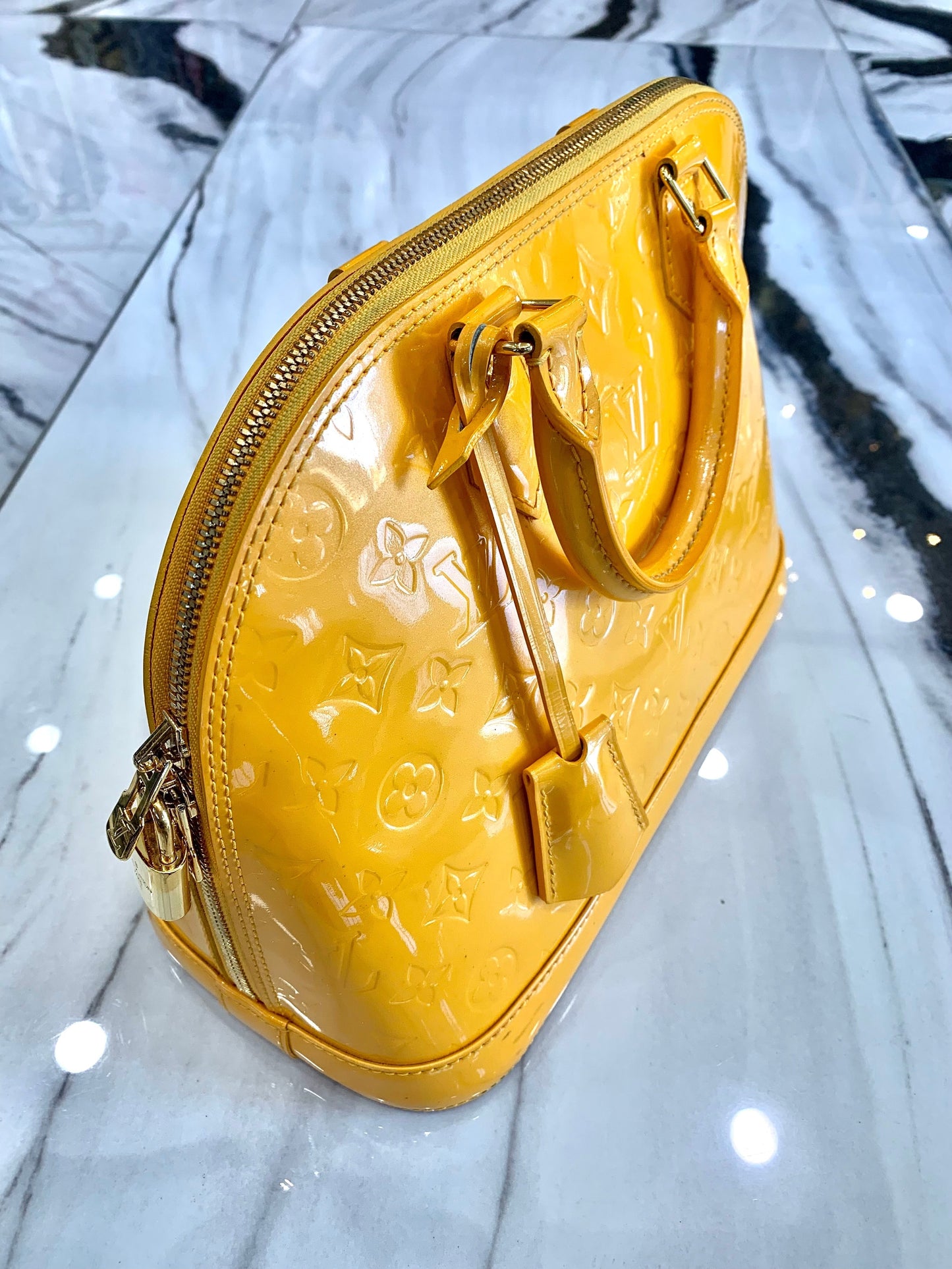 LOUIS VUITTON VERNIS ALMA PM Handbag