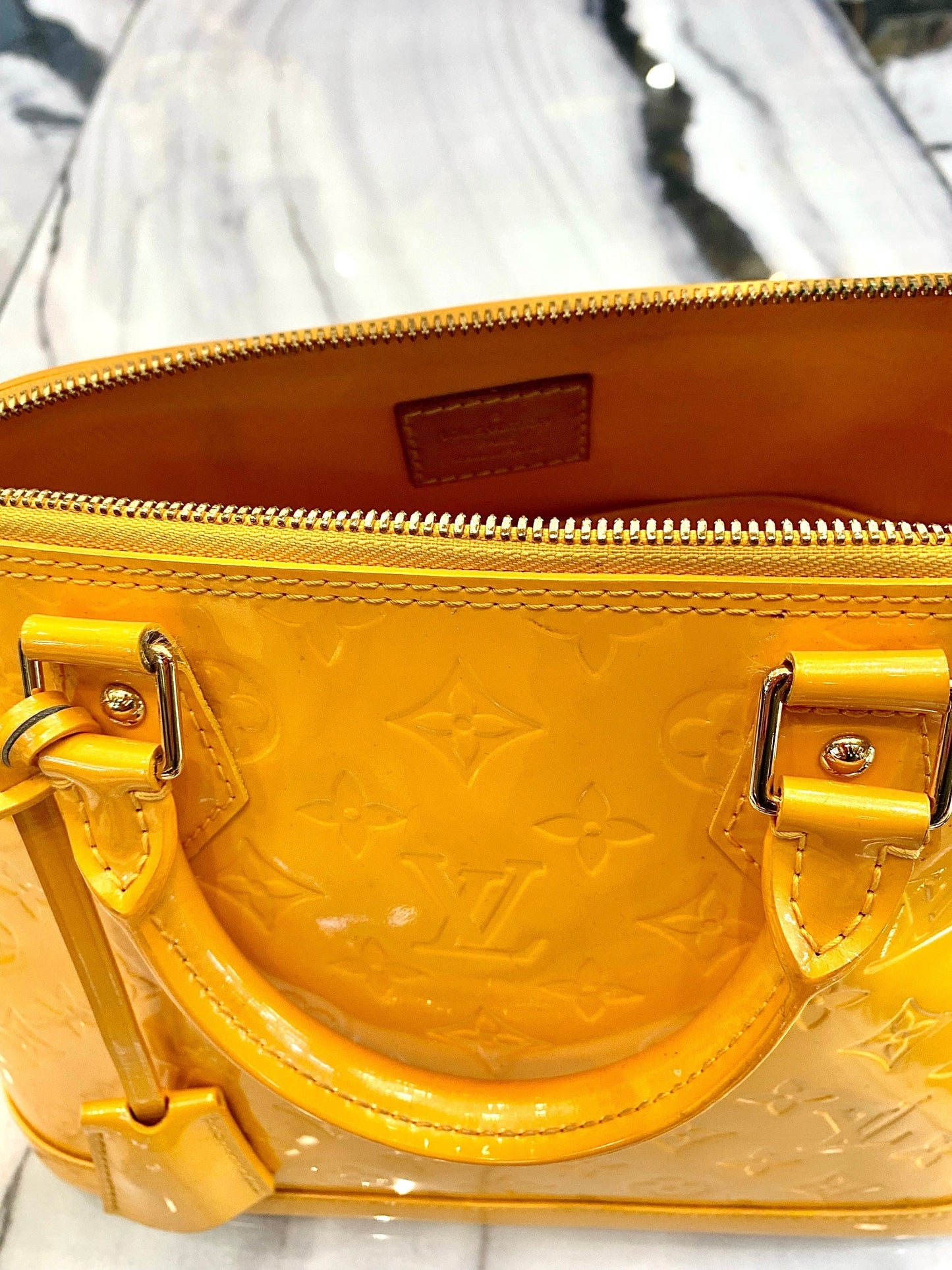 LOUIS VUITTON VERNIS ALMA PM Handbag