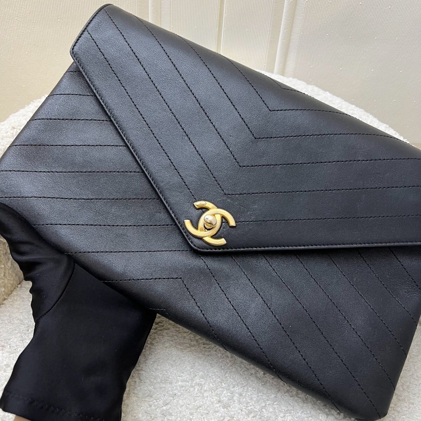 Chanel Clutch in Chevron Quilted Black Calf Leather and AGHW