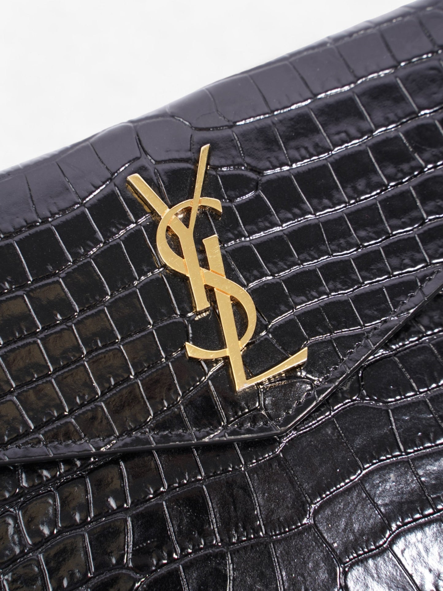 Saint Laurent Uptown Clutch Black Embossed Leather Small