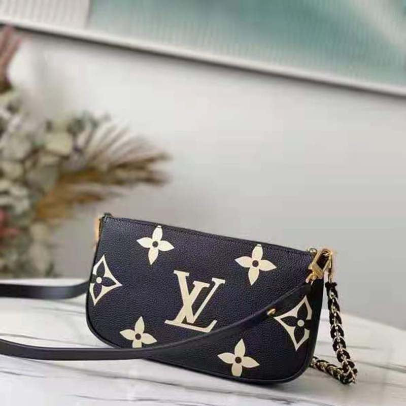Louis Vuitton Unisex Multi Pochette Accessoires Black Cream Embossed Supple Grained Cowhide Clutch