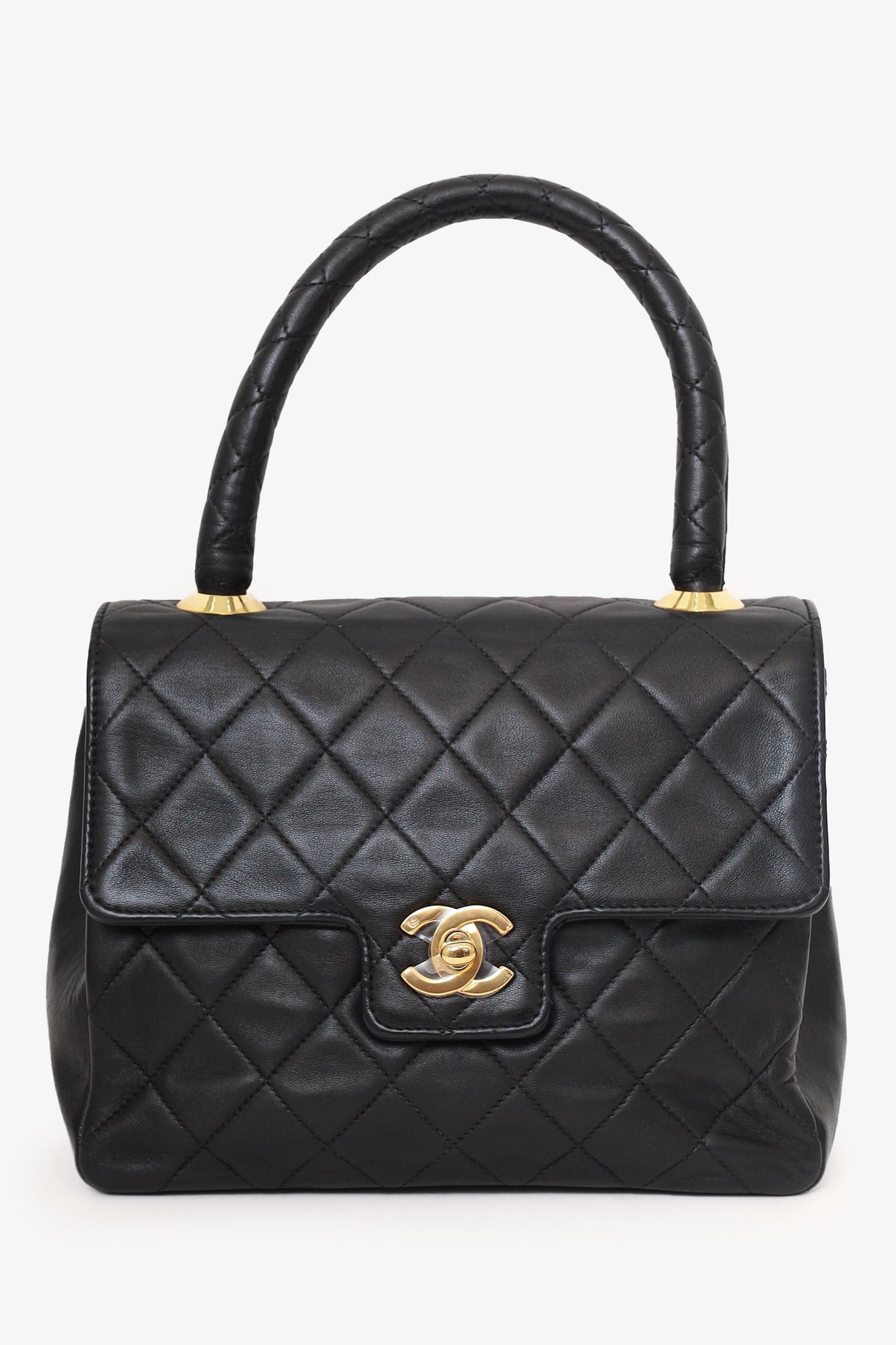 Chanel™ 1991-94 Black Quilted Lambskin Kelly Top Handle Bag