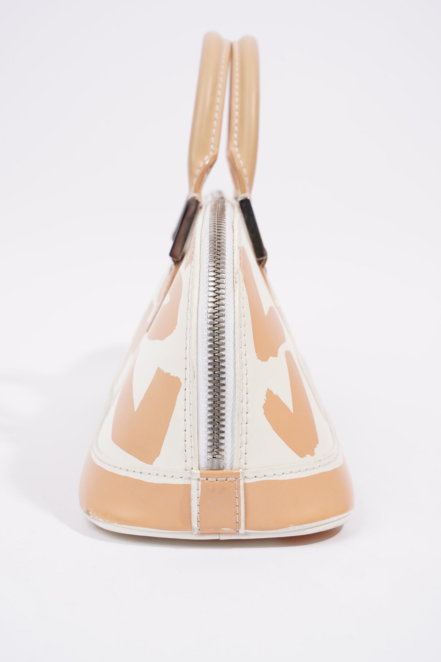 Louis Vuitton Alma Long Stephen Spro White / Nude Coated Canvas Handbag