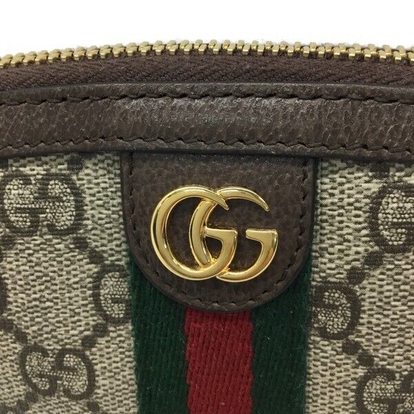 Gucci Monogram Canvas Clutch