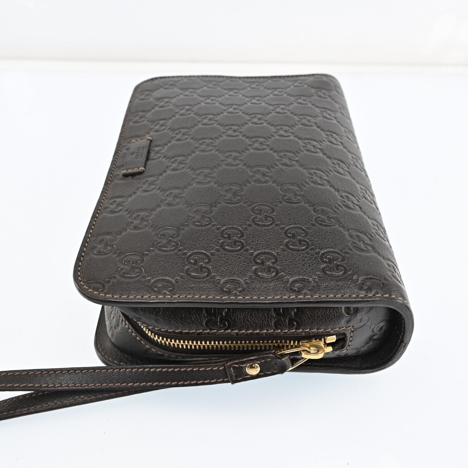 Gucci Monogram Leather Clutch