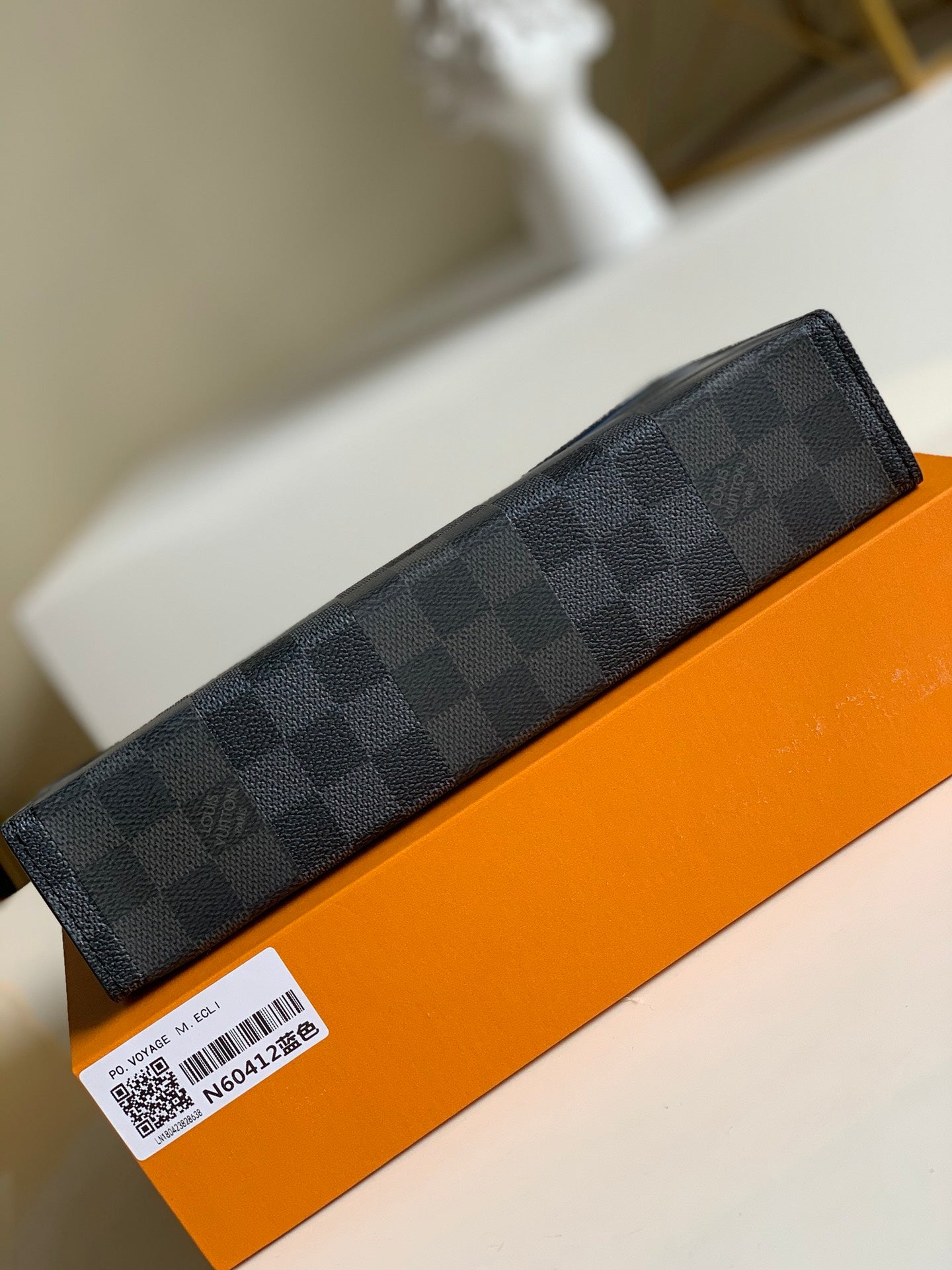 Louis Vuitton Pochette Voyage MM Clutch