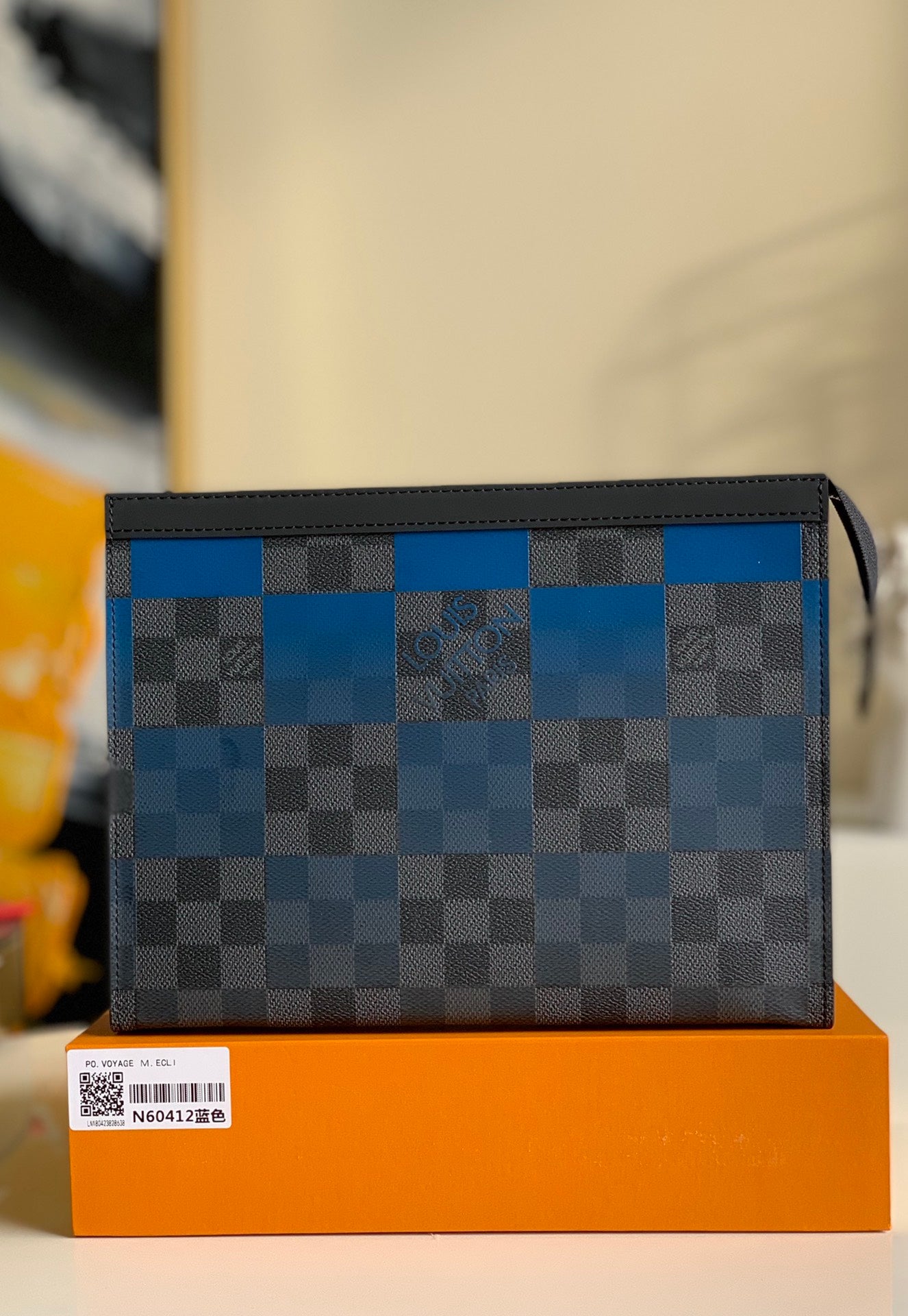 Louis Vuitton Pochette Voyage MM Clutch