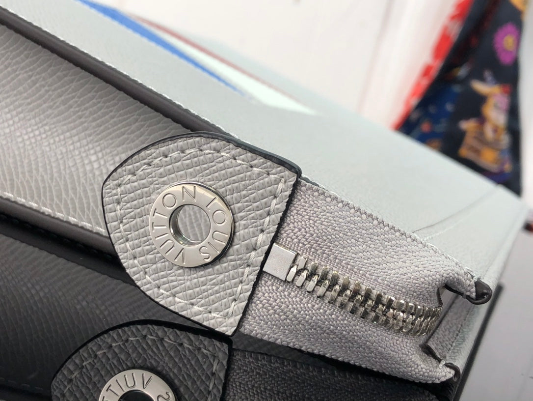 Louis Vuitton Pochette Voyage MM Clutch