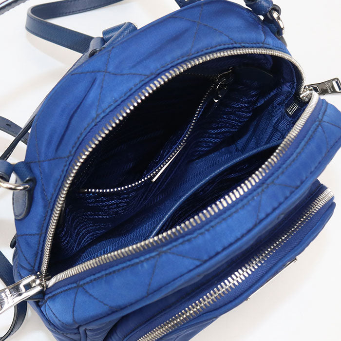 PRADA Backpack mini daypack Nylon, leather blue Women