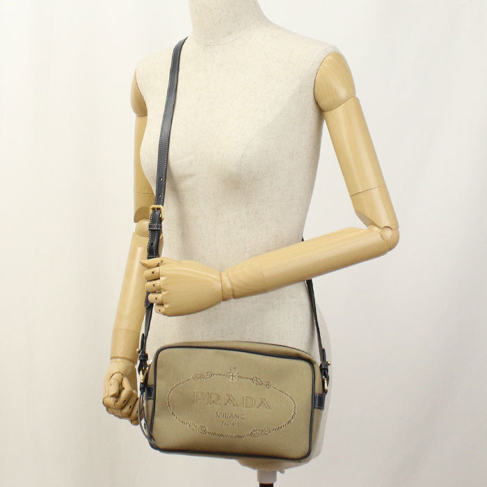 PRADA Logo jacquard Diagonal shoulder bag canvas/leather Women brown